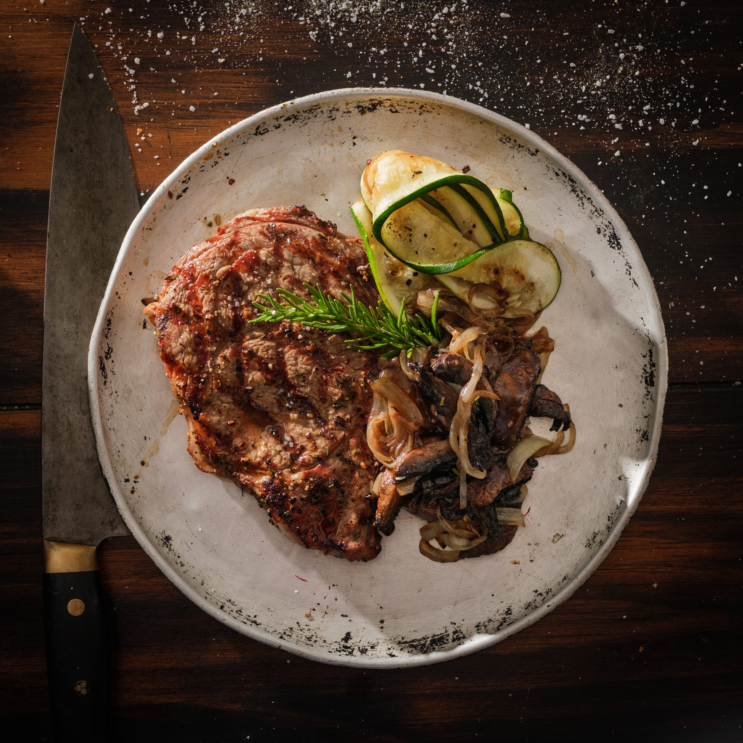 Grilled Veal Ribeye with Grill Sautéed Portobello Mushrooms & Onions