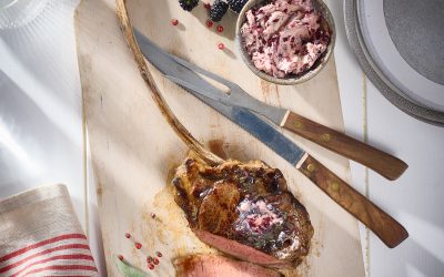 Grilled Veal Tomahawk Chop with Blackberry Pink Peppercorn Butter