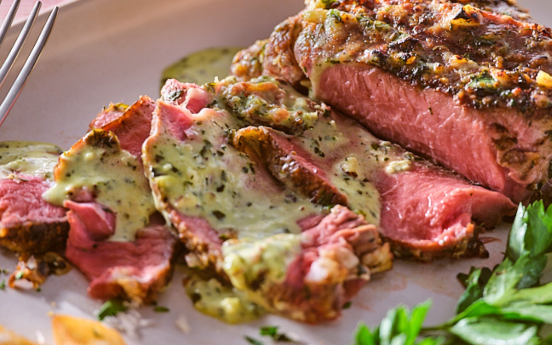 Parmesan Crusted Grilled Veal Rib Steaks with Amaretto Hazelnut Three Herb Pesto Cream Sauce